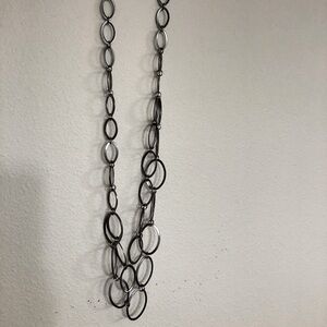 Medium weight necklace. Gun metal color